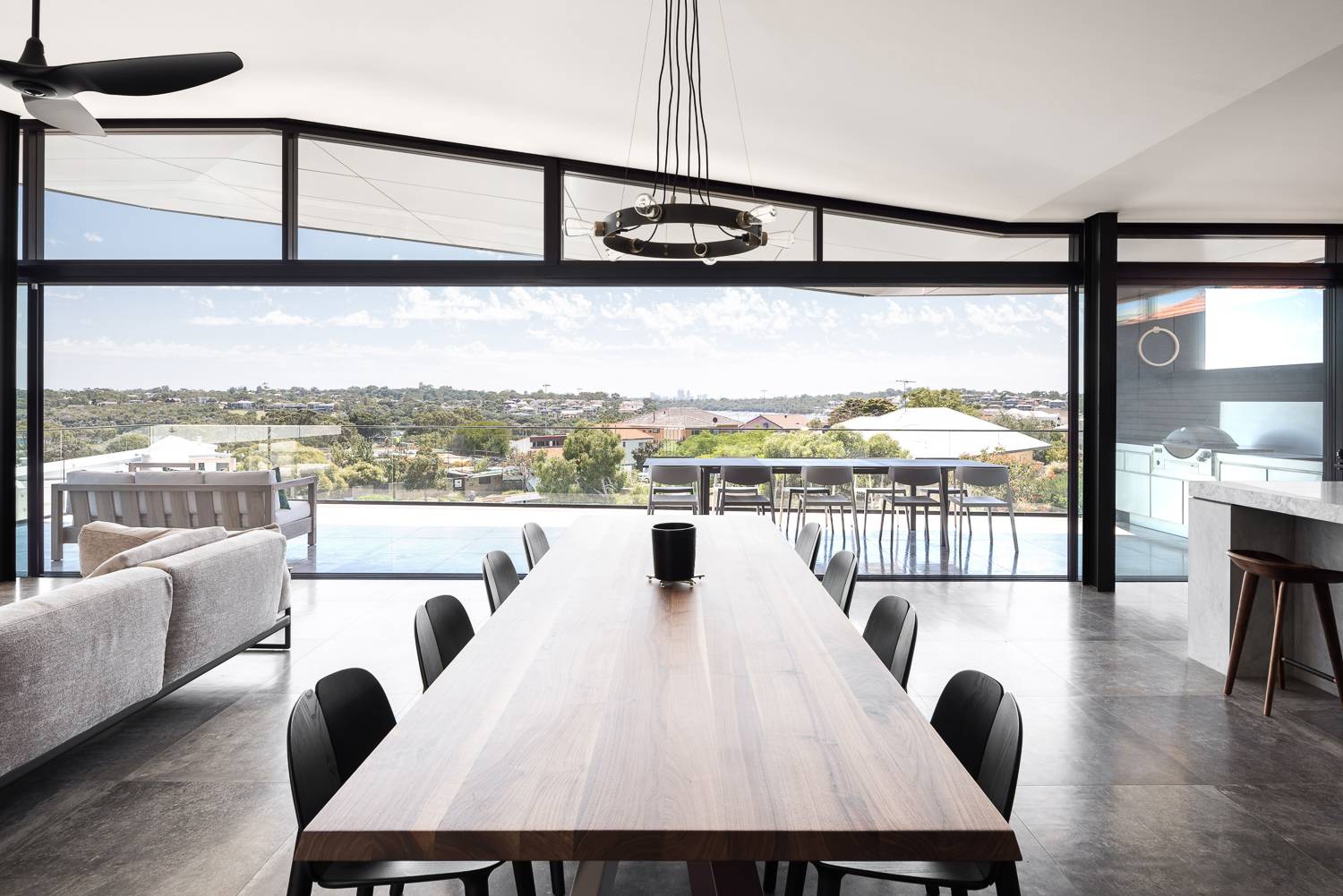 Picture of a dining room with black chandelier